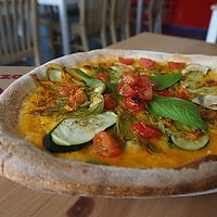 Courgette flower pizza at Purezza in Brighton
