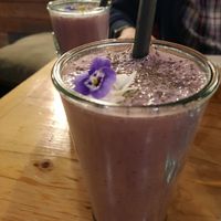 Hanging Like a Monkey smoothie with a well-balanced mix of banana, raspberry, blueberries and flaxseed. Delicious. at Purezza in Brighton