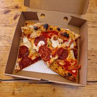 Five cheese pizza with pepperoni at Purezza in Brighton