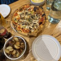 Mac & cheese, garlic potatoes, and veggie pizzaa  at Purezza in Brighton