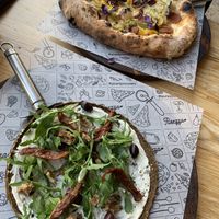 Amazing pizzas and the profit from one of them goes to a charity which takes care of the farm animals 💕 at Purezza in Brighton