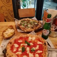'Margarita' and 'Here comes truffle' with Mac n cheese' side at Purezza in Brighton