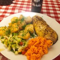 Aubergine "fish" with potatoes and salad. at Pomylone Gary in Lublin