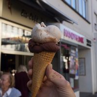 Chocolate ice cream and coconut ice cream. at Eis Cafe De Lorenzo in Saarbrucken