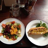 mango salad and hotdog at Vegan Hippo in London