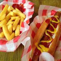hot dog and a side of fries  at Vegan Hippo in London