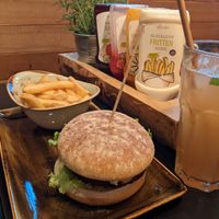 A veggie burger and fries, note all sauces are vegan at Hans im Glück - Isartorplatz in Munich