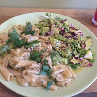 Brown rice penne in creamy broccoli sauce and mixed salad! at Organitheka in Warsaw