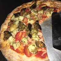 So delicious! Vegan eggplant pizza with added daiya cheese at KC Artisan Pizza in Lakeland