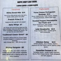 Happy hour menu. not vegan friendly  at Tiki Iniki in Princeville