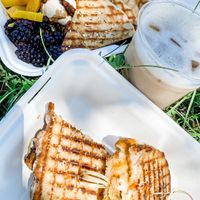Reuben, cheese plate, and iced tulsi chai at Dobra Tea in Asheville