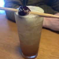 A Buffy the Vampire slayer cocktail with a stake through a cherryy  at East Glisan Pizza Lounge in Portland