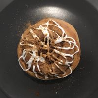 Steamed bread shaped like a cinnamon roll with a lemon glaze at MuYe - Mottainai in Kaohsiung