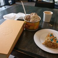 Reading while enjoying ice cream, coffee and a rice crispy treat. All vegan! at Fat Cats in Austin