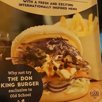Big burger poster at Old School Vegetarian Restaurant in South West London