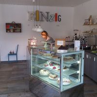 The cakes & owner in background at Einzig in Bad Vilbel