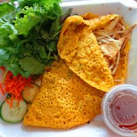Tofu Crepe. Bánh Xèo (Vietnamese Crêpes) are made with rice flour and turmeric gives them their color. Greens are fresh lettuce, cilantro, mint. My favorite item there by far! at Bowl of Pho in Woodmere