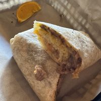 Steak and potato burrito (and a piece of a very bruised orange)  at The Nile in Mesa