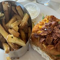 Honey mustard fried chicken sandwich with no honey mustard, Gardein vegan chick'n, vegan cheese, vegan coconut bacon, vegan truffle aioli, truffle fries  at Mustard Seed Market - Highland Sqaure in Akron