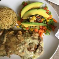Eggplant and mushroom mix, yummy salad and brown rice at Restaurante Integro in Bogota