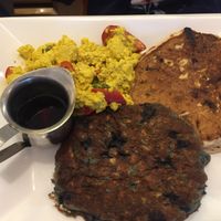 Kid’s plate - “You pick 3” - this is the tofu scramble, a blueberry oatmeal pancake and a banana chocolate chip pancake  at Cosmic Treats in Toronto