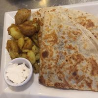 Special of the week - Quesadilla with cheese, beans, veggies and added chick’n at Cosmic Treats in Toronto
