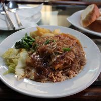 Rice with fried tofu, seasonal vegetables, sauce, chillies. at Loving Hut in Addis Ababa