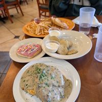 Reuben, fried pickles, biscuits and gravy, and sugar cookie at Lovin' Spoonfuls in Tucson
