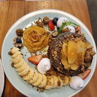 Vegan pancakes with Apple caramel crummble and seasonal fruits at Theera in Bangkok