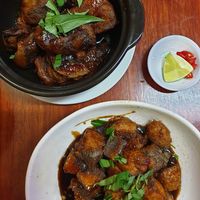 Fish claypot (top) and braised chickn and tofu at Bo De Trai in Footscray