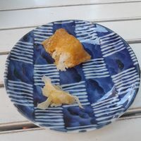 Half eaten inarisushi onigiri at Matcha Komachi in Vienna