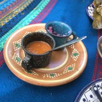 Sauces and pickled red onions  at Suculenta in Tulum