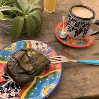 Tamale, latte and juice  at Suculenta in Tulum