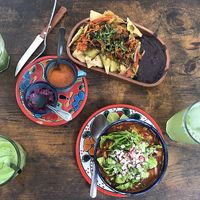 Vegan pozole and chilaquiles, after i took a mole tamale  at Suculenta in Tulum