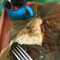 Vegan corn & carrot tamale with chocolate mole sauce at Suculenta in Tulum