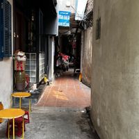 There‘s signs outside the alley, too.   at Bao An Vegan (formerly Vegan Banhmi) in Hanoi