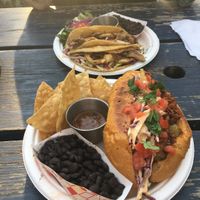 Chayote y chorizo torta and oyster mushroom tacos. All delicious and he tortillas and bread were super fresh.  at La Botanica in San Antonio