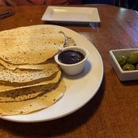 Poppadums and orange stuffed olives   at Aroma Thyme Bistro in Ellenville