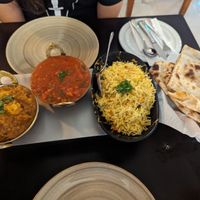 Aloo Gobi, (forgot the name), lemon rice and vegan naan at Gandhi Tandoori in St Pauls Bay
