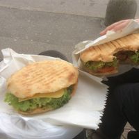 A burger and sausage in flat bread  at Vege Fino Za Sve in Zagreb