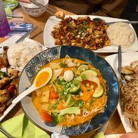Crispy chicken dish, curried soup, rice noodle dish, and mapo tofu at Sampan in Frankfurt