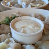 Vegan Piroggi filled with vegan minced meat, vegan cheddar, vegan Mayo, Ketchup and vegan Mayo as a Dip at Pierogarnia Mandu Oliwa in Gdansk