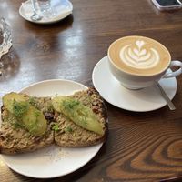 Vegan pate and pickle sandwich with an oat latte  at Retro in Gdansk