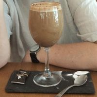 Latte in a wine glass, weird! at daTerra - Baixa in Porto