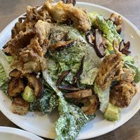 Ceaser with chicken fried mushrooms at Cafe Gratitude in San Diego