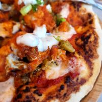 Buffalo Cauliflower pizza at Cafe Gratitude in San Diego