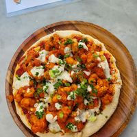 Coliflower buffalo style pizza at Cafe Gratitude in San Diego