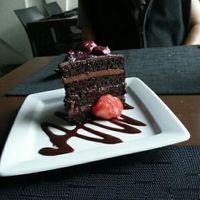 Black Dolce - chocolate cake with dark berries at Nümen in Merida