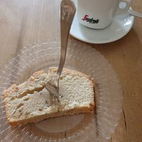 Lemon lavender cake and cappuccino at Cafe Leander in Bamberg