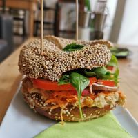 Bagel with hummus and fresh salad at Cafe Leander in Bamberg